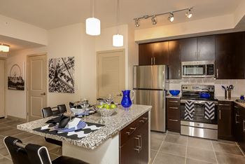Kitchen island with pendant lighting & usb outles